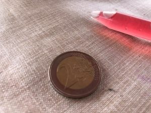 experimento gotas en una moneda
